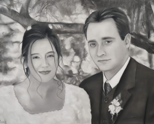 Dibujo al carboncillo de una pareja de recién casados, un ejemplo de los retrato de encargo que hacemos en Galería del Retrato