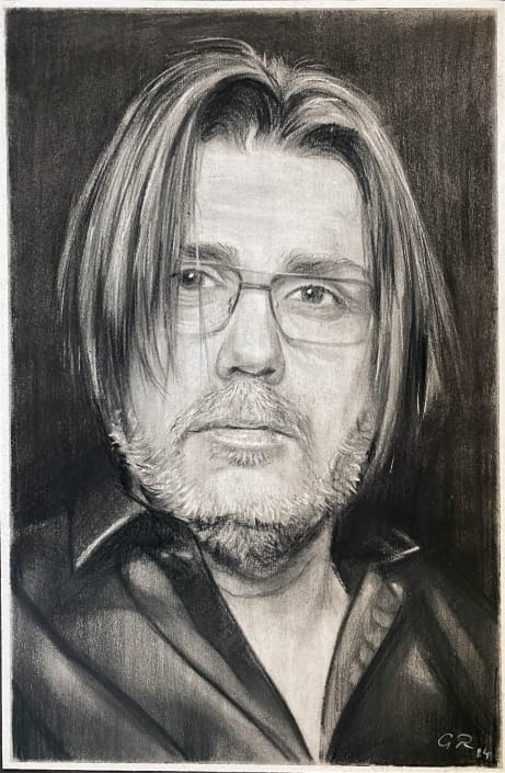 Retrato al carboncillo con estilo realista a partir de fotos